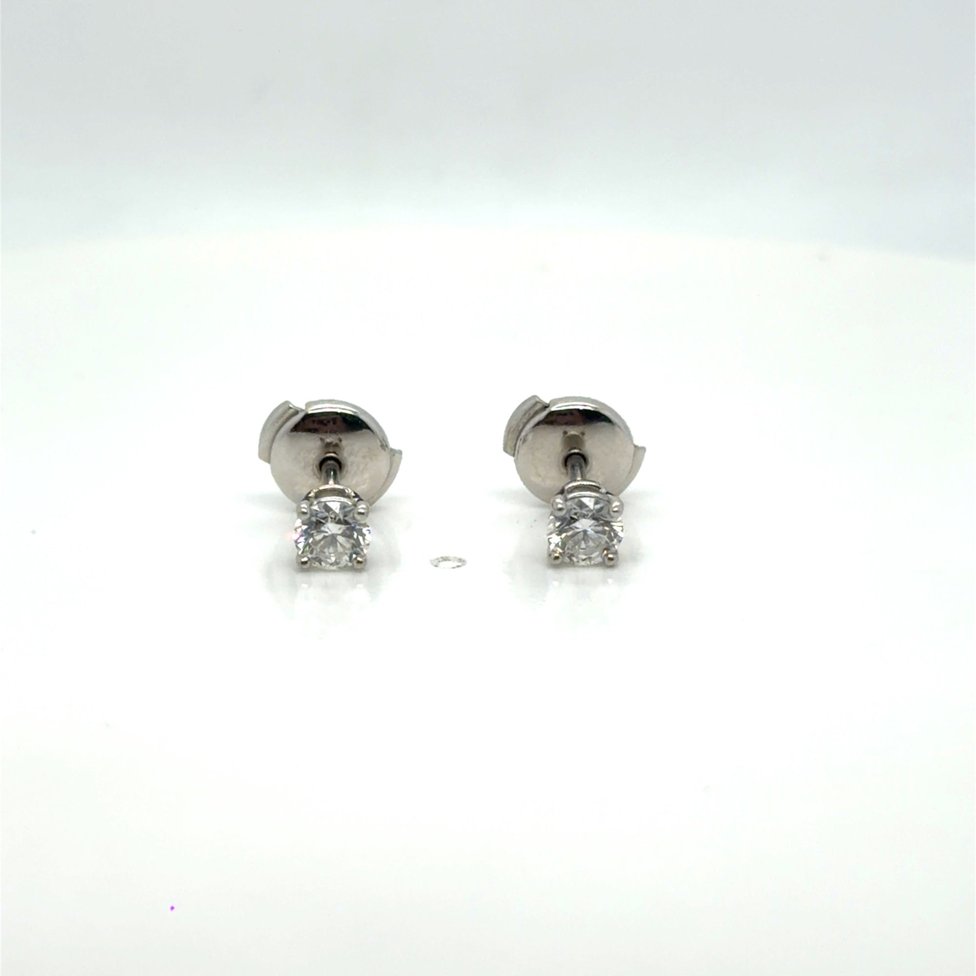 Tiffany & Co. Platinum Diamond Stud Earrings 0.60 ctw H VVS Certified (view 4)