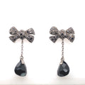 Pomellato 18k bow design dangle earrings with black dias and onix (view 1)