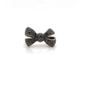 Pomellato ring 18K two tone bow design with 0.70ctw black dias. size 5 (view 1)