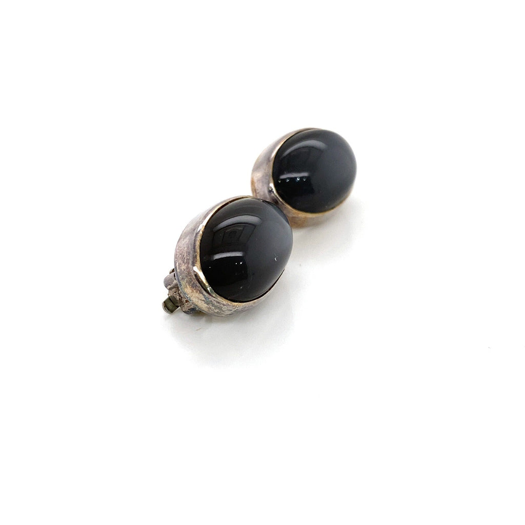Stephen Dweck silver clip earrings with oval cabochon black Diopside stone. (view 2)