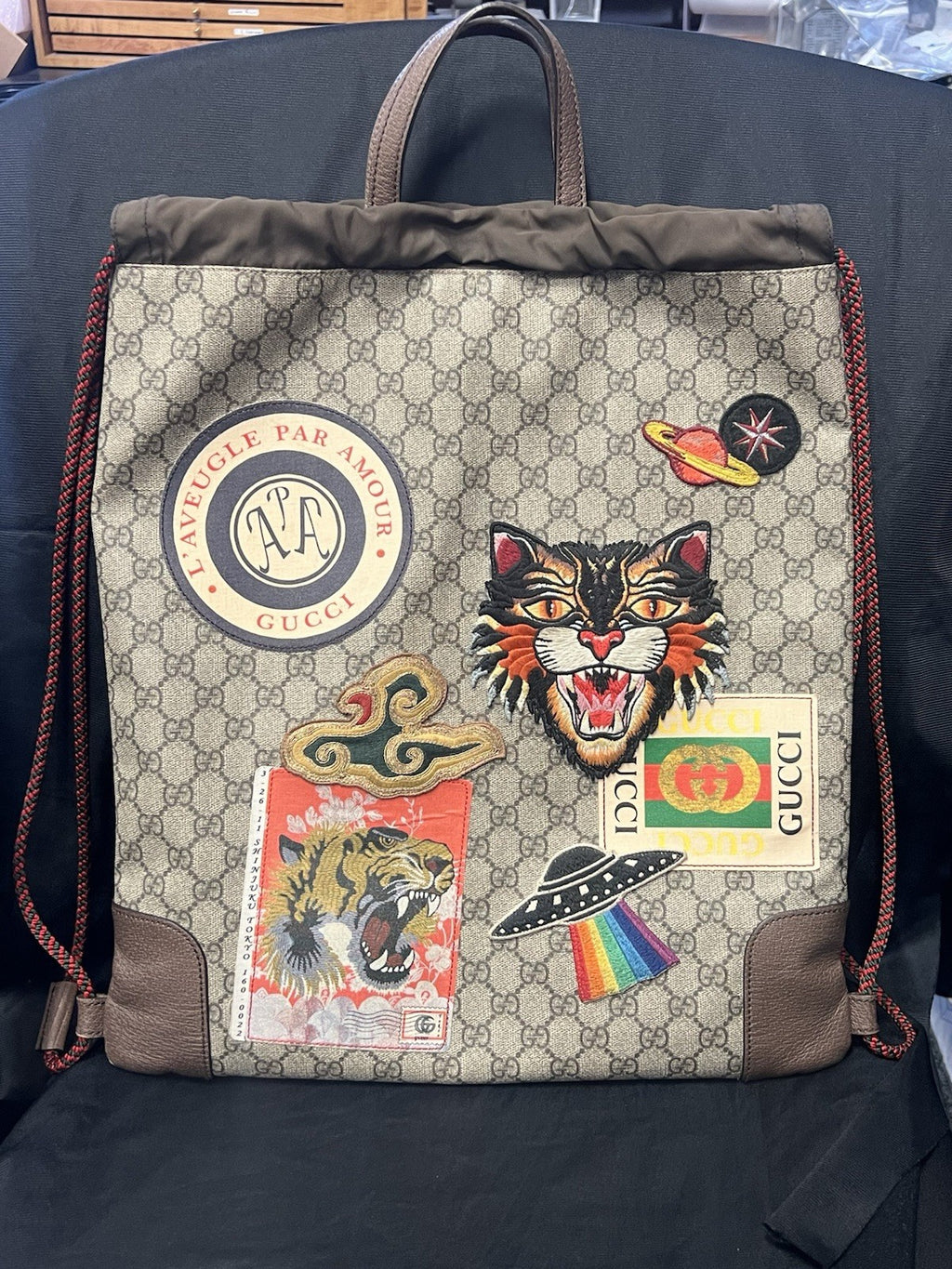 GUCCI SOFT GG SUPREME MONOGRAM DRAWSTRING BACKPACK EMBROIDERED PATCHES — view 2