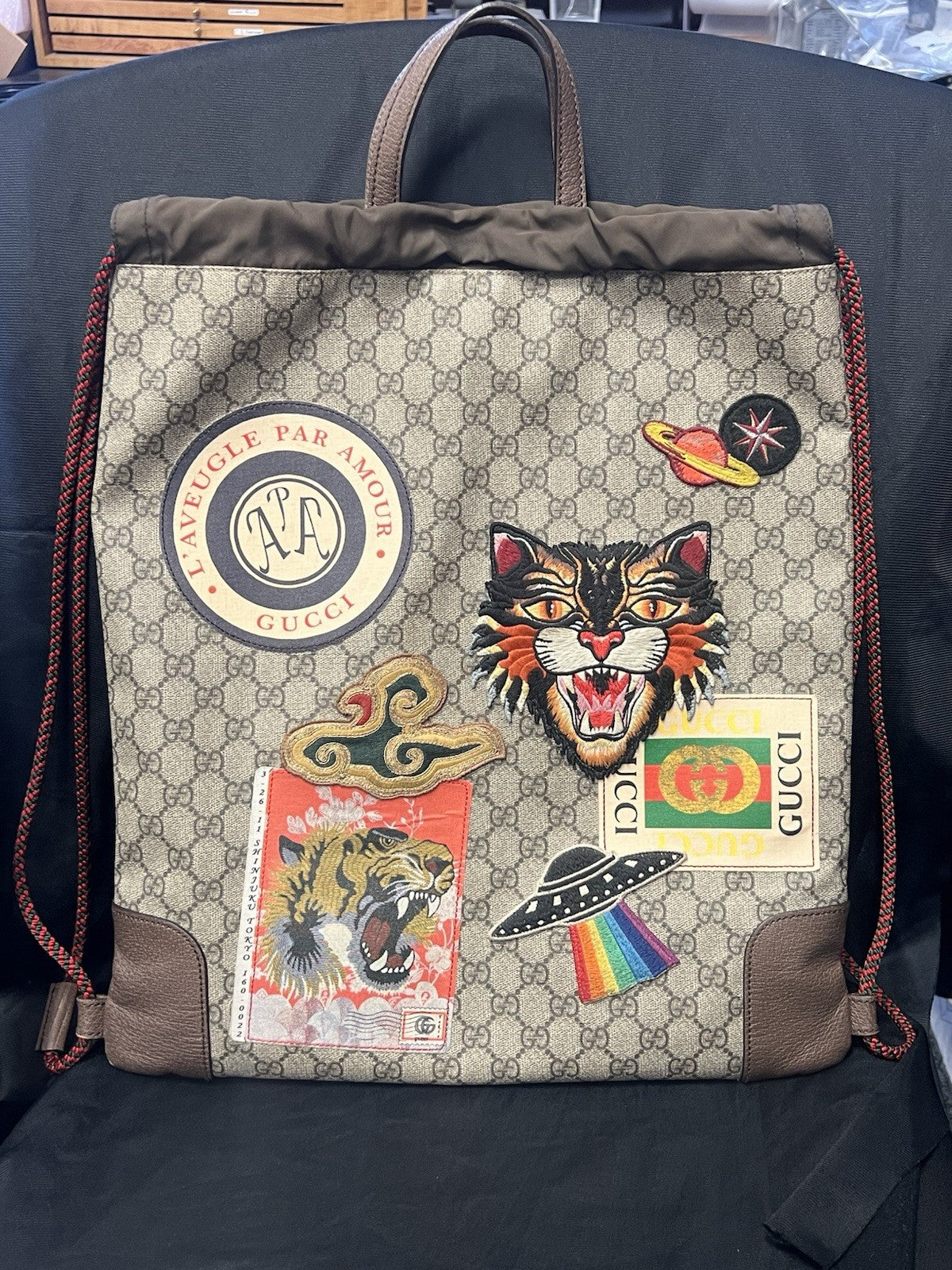 GUCCI SOFT GG SUPREME MONOGRAM DRAWSTRING BACKPACK EMBROIDERED PATCHES — view 2