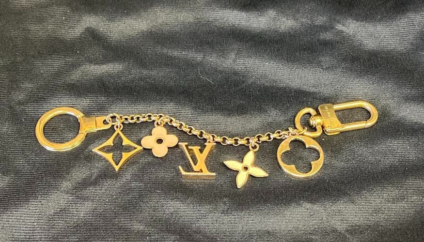 LOUIS VUITTON CHAIN FLEUR DE MONOGRAM BAG CHARM CHAIN GOLD/NUETRAL1