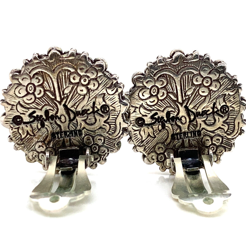 Stephen Dweck silver earrings w/ round black Star Diopside cabochon, clip backs. (view 4)