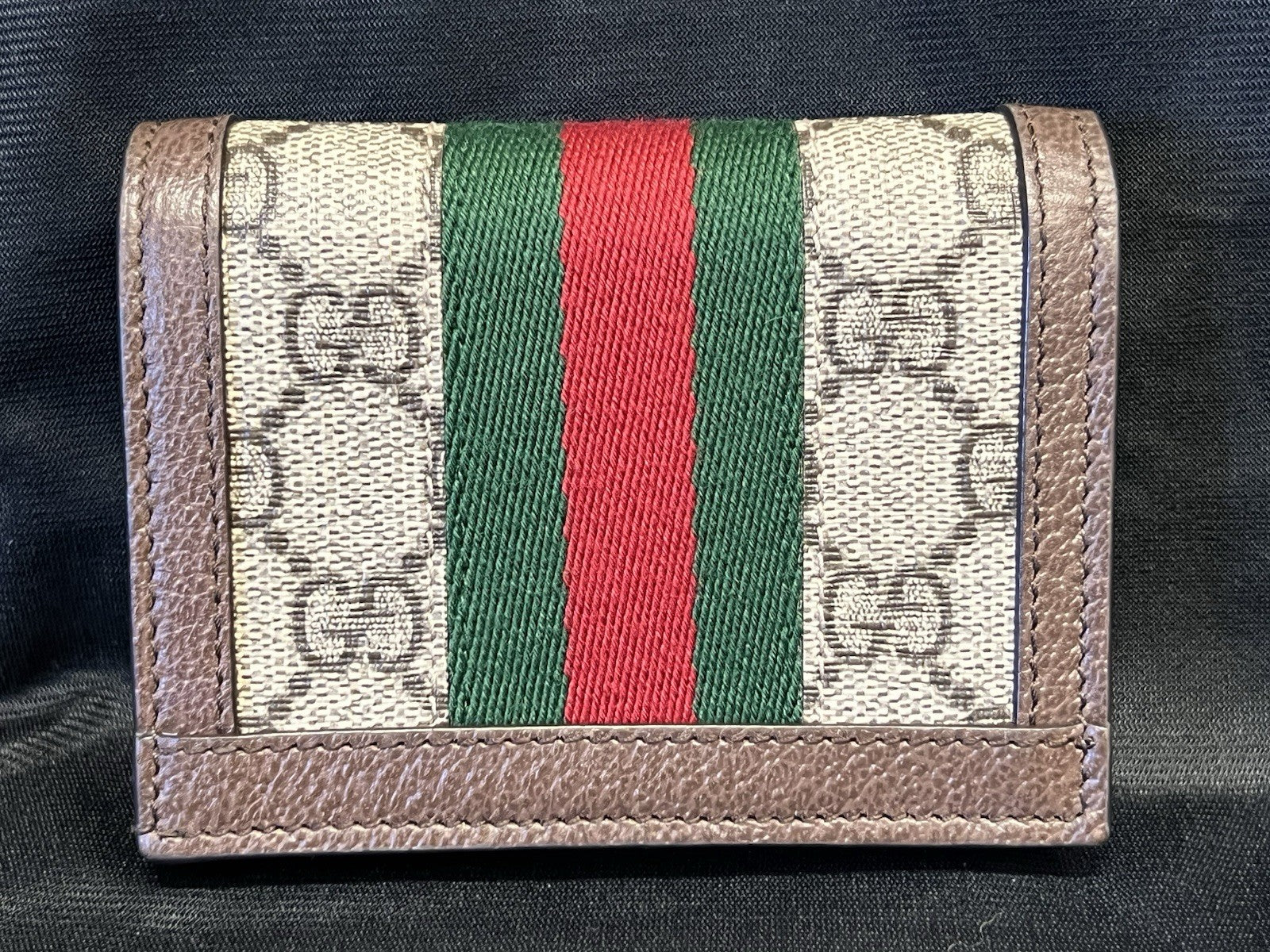 GUCCI OPHIDIA GG SUPREME CANVAS AND LEATHER COMPACT WALLET1