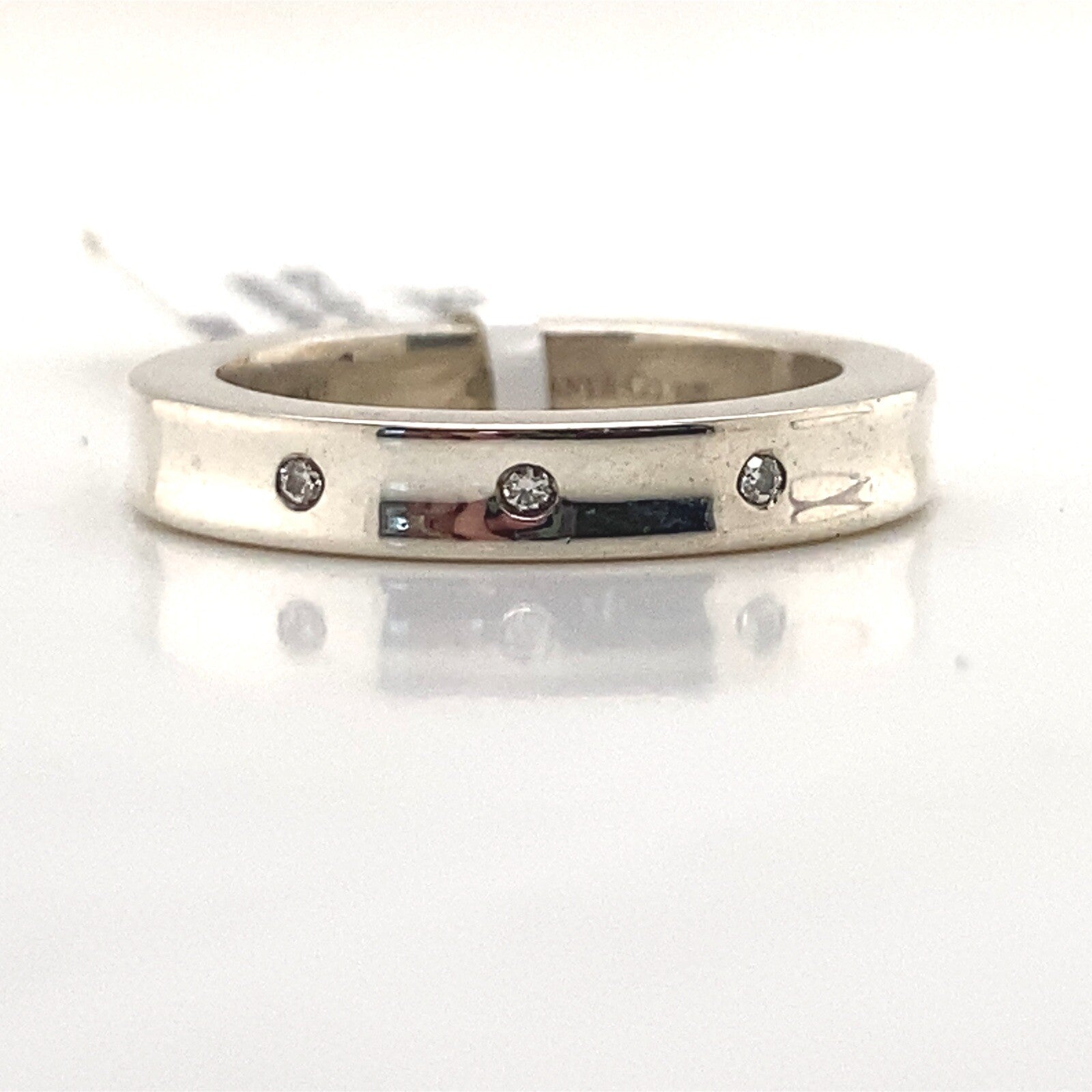 0.05tcw Tiffany & Co. Sterling Silver 3 Diamond 4mm Band Ring Size 5 — Certified Authentic | San Diego Jewelry Buyers