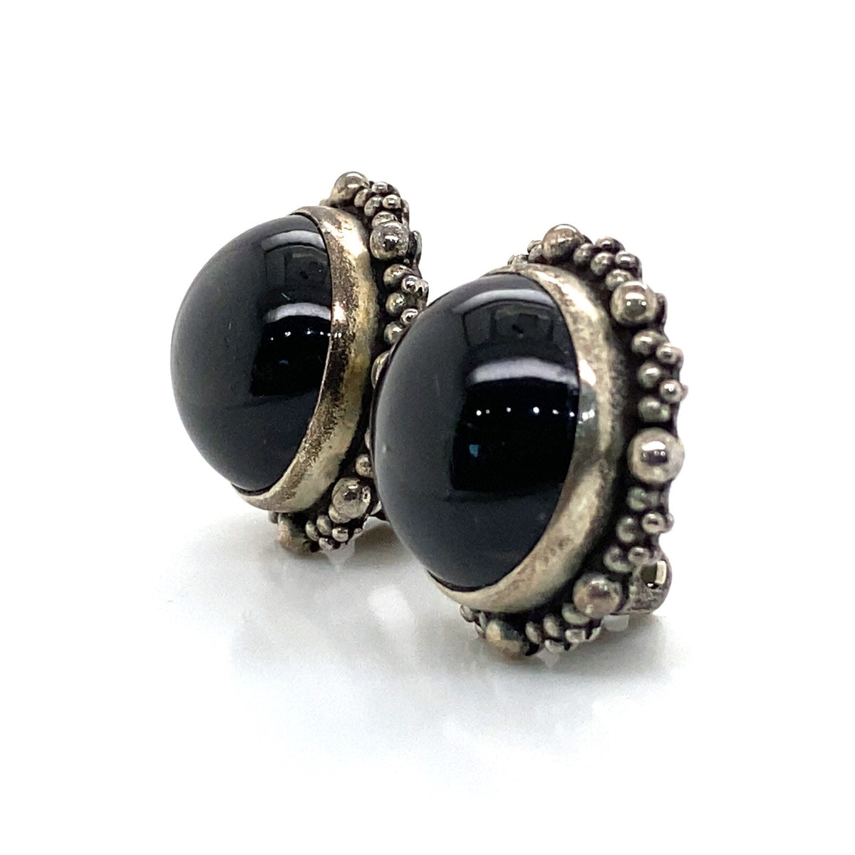 Stephen Dweck silver earrings w/ round black Star Diopside cabochon, clip backs. (view 2)