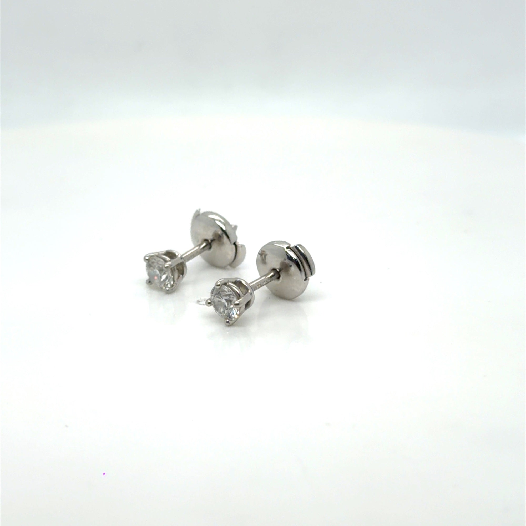 Tiffany & Co. Platinum Diamond Stud Earrings 0.60 ctw H VVS Certified (view 12)