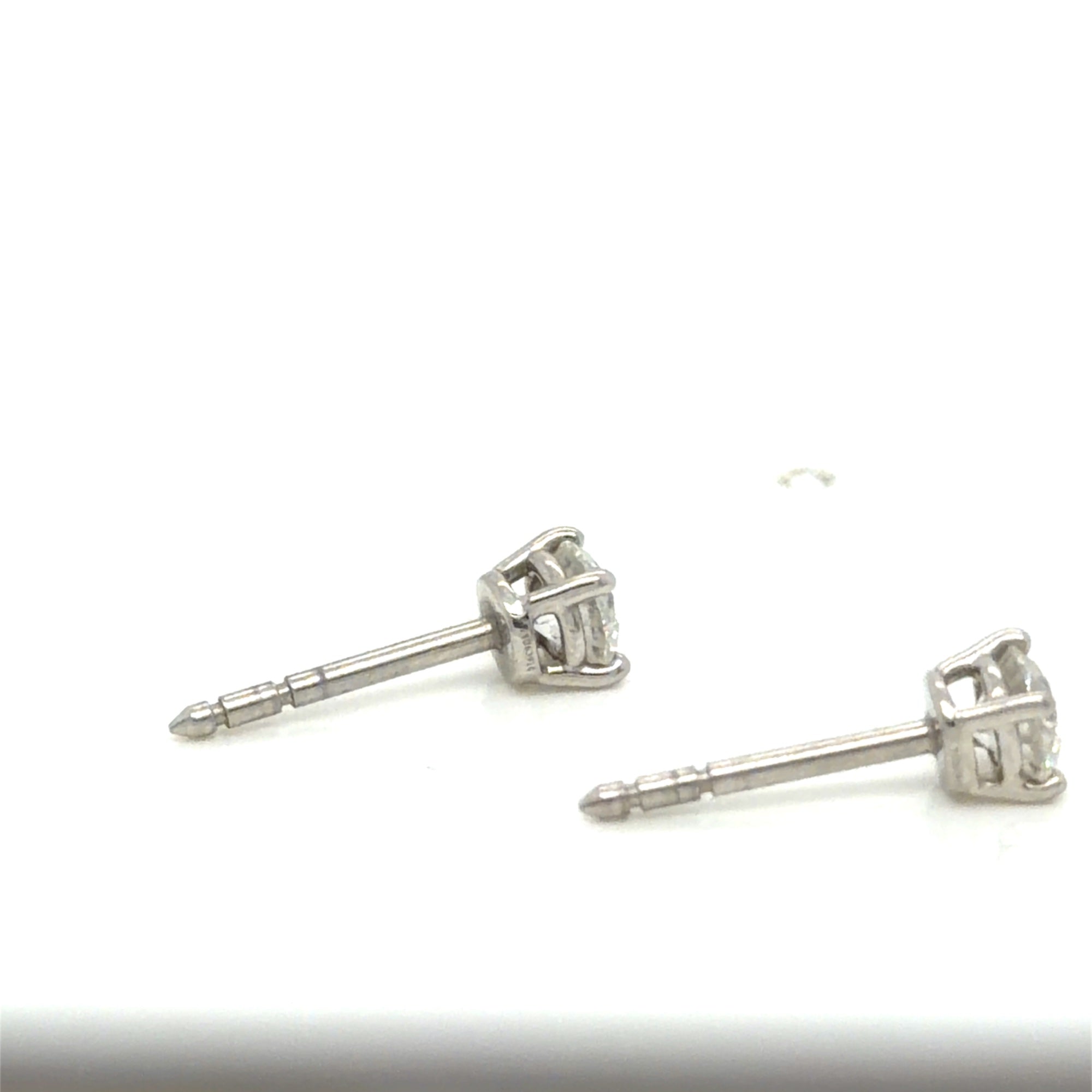 Tiffany & Co. Platinum Diamond Stud Earrings 0.60 ctw H VVS Certified (view 16)